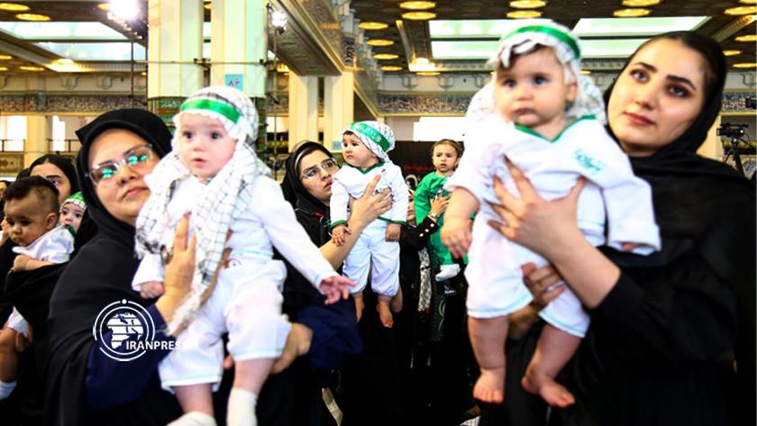 Iranpress: طهران .. مراسم الطفل الرضيع العالمي من عدسة إيران برس + صور 