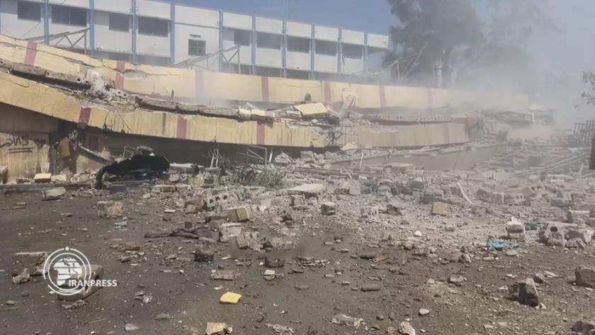 Iranpress: استشهاد 12 فلسطينيا جراء مجزرة جديدة في قصف مدرسة في غزة