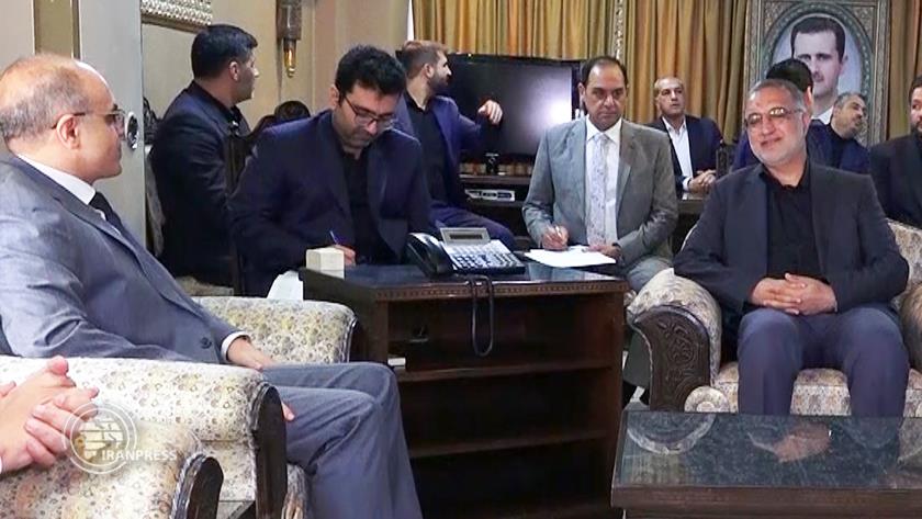 Iranpress: التعاون المشترك.. محور مباحثات رئيس بلدية طهران ووزير الاقتصاد السوري بدمشق