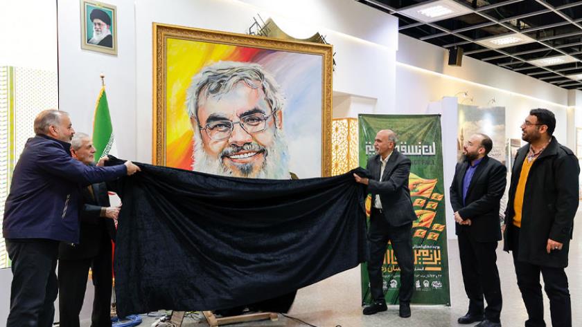 Iranpress: تنظيم الحدث الفني ‘العلم لا يسقط على الأرض’ في العتية الرضوية