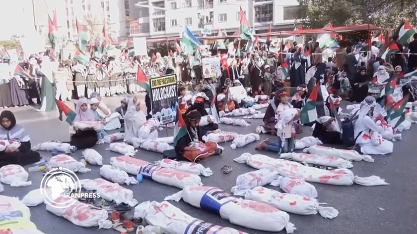 Iranpress: تجمع آلاف الأشخاص في كراتشي دعماً لغزة وإدانة للجرائم الإسرائيلية + فيديو