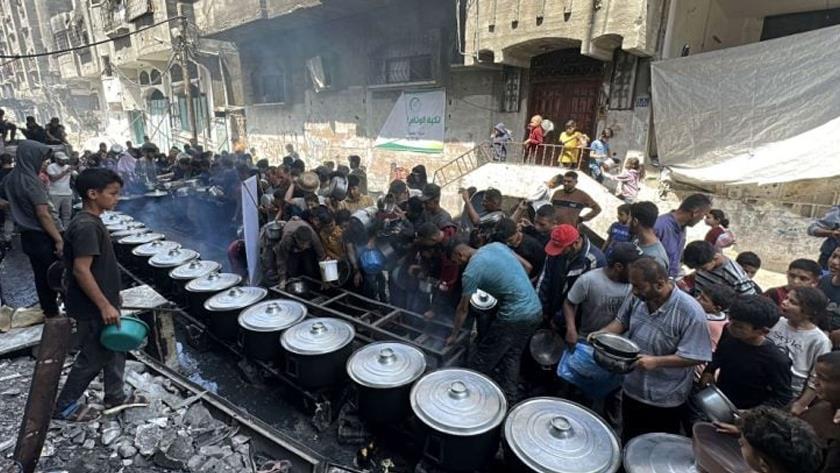 Iranpress: ضحايا الجوع في غزة.. 57 شهيدًا وإدانات لاستخدام الاحتلال الغذاء كسلاح حرب