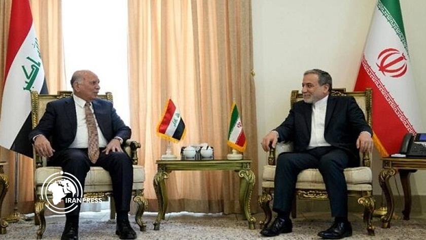 Iranpress: بحث التحديات العالمية، محور لقاء وزيري خارجية إيران والعراق + فيديو