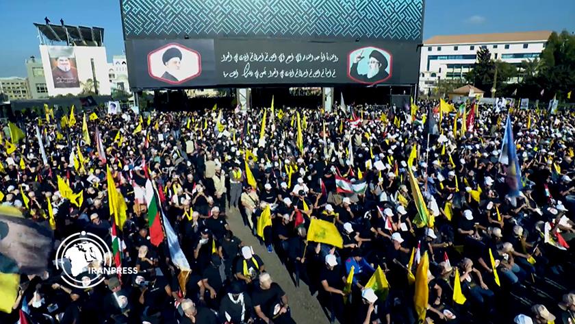 Iranpress: لبنان يحيي الذكرى السنوية الأولى لاستشهاد السيد حسن نصر الله+ فيديو