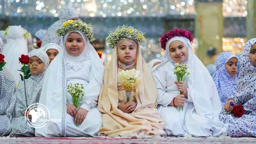 Iranpress: بالصور .. أكثر من 15 ألف فتاة في العراق يحتفلن بارتداء الحجاب الإسلامي 