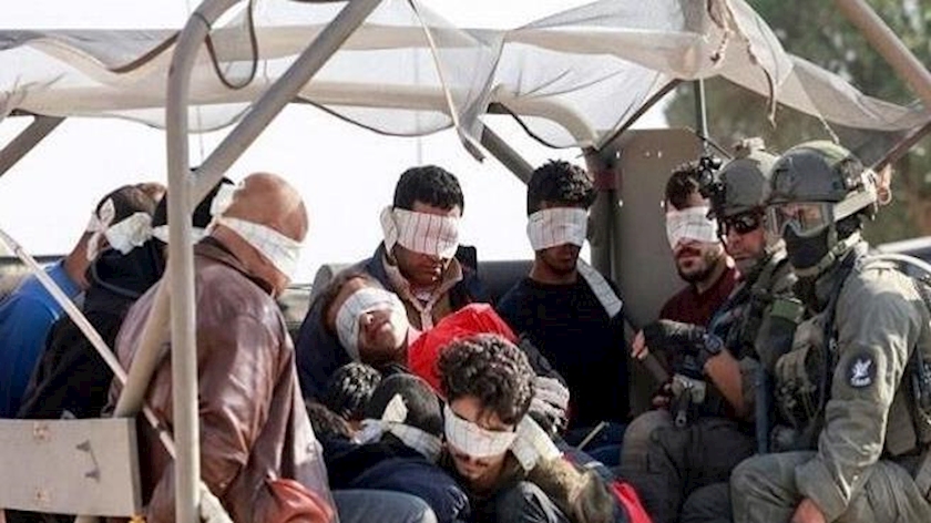 Iranpress: تحویل ۹ نفر از اسیران اهل غزه به کمیته بین المللی صلیب سرخ 