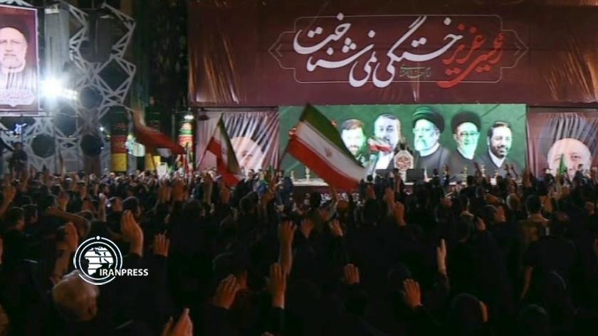 Iranpress: برگزاری مراسم شام غریبان شهید آیت الله رئیسی و شهدای خدمت در میدان امام حسین تهران