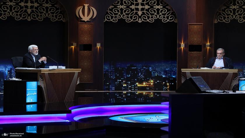 Iranpress: نگاهی به نخستین مناظره دور دوم نامزدها در آستانه انتخابات