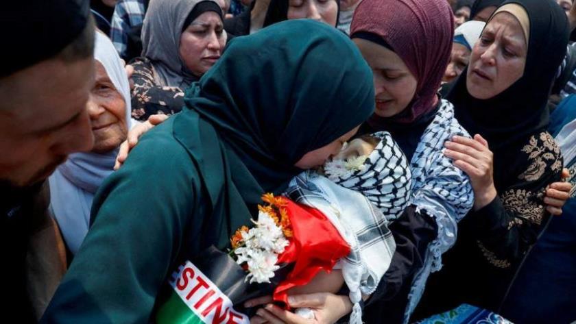 Iranpress: روز جهانی منع خشونت علیه زنان همزمان با وضعیت غم انگیز زنان غزه