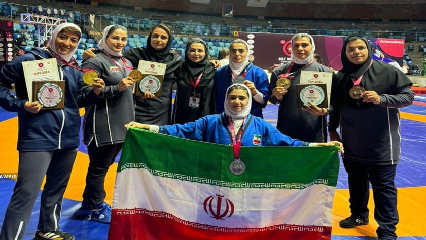 Iranpress: تیم ملی کشتی آلیش زنان ایران قهرمان آسیا شد