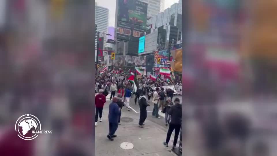 Iranpress: مظاهرة في مدينة تورنتو الكندية دعمًا لـ فلسطين وإيران