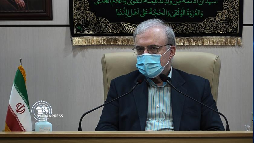 Iranpress: Health min.: Iran grappling with sanctions, COVID-19 simultaneously