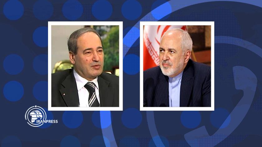 Iranpress: Zarif congratulates Mekdad on his election as Syrian FM