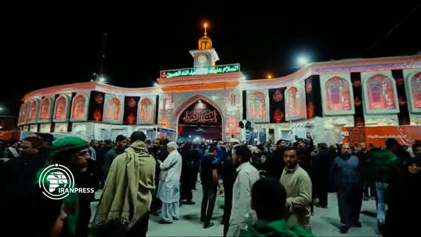 Iranpress: Millions march to Karbala by foot to pay tributes to Imam Hossein  