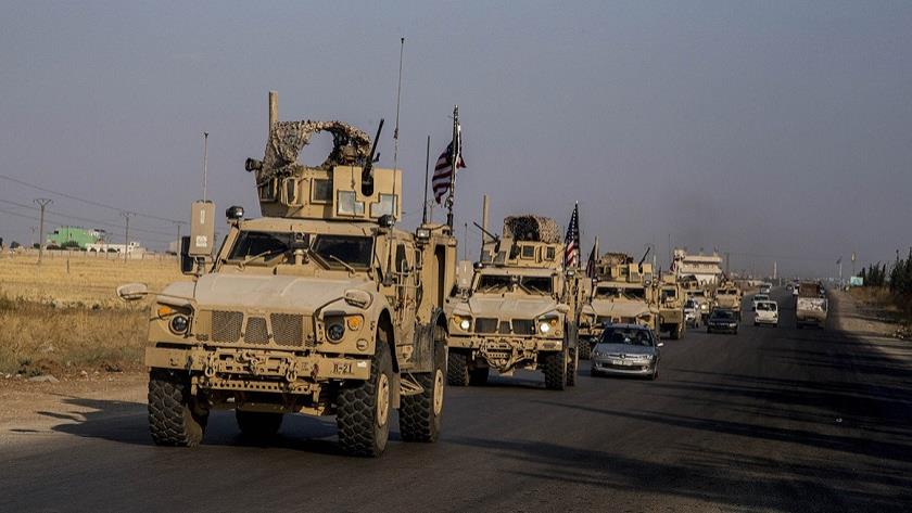Iranpress: US troops looting Syrian agricultural products