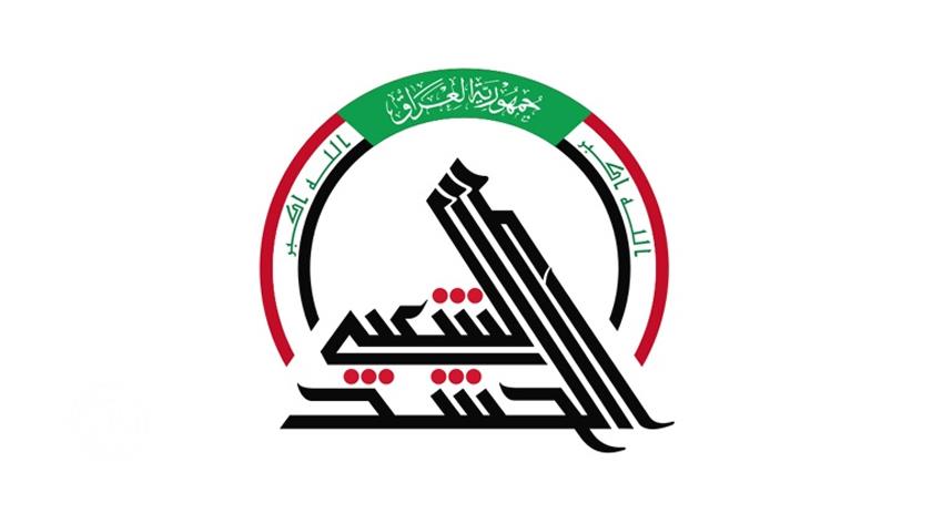 Iranpress: PMF: US targeted our positions not on Syria but on Iraqi border