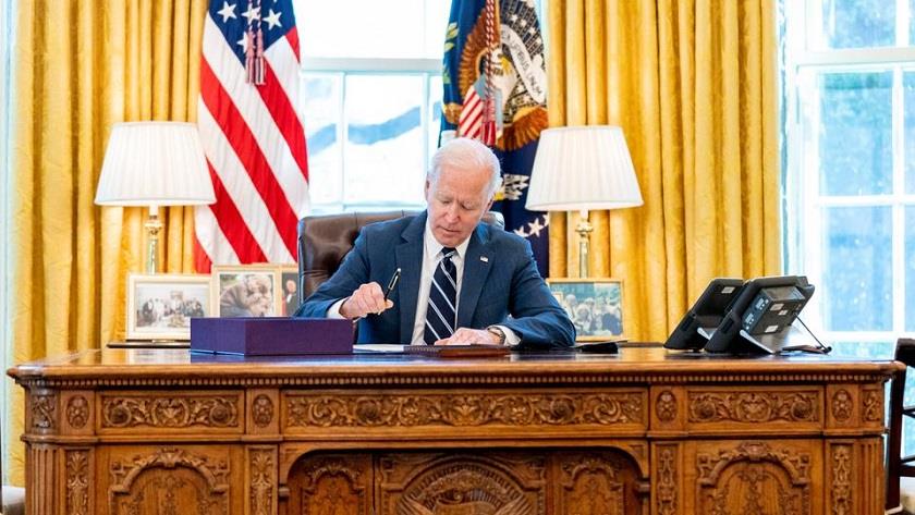 Iranpress: Biden signs $1.9T stimulus bill helping US covid hit economy