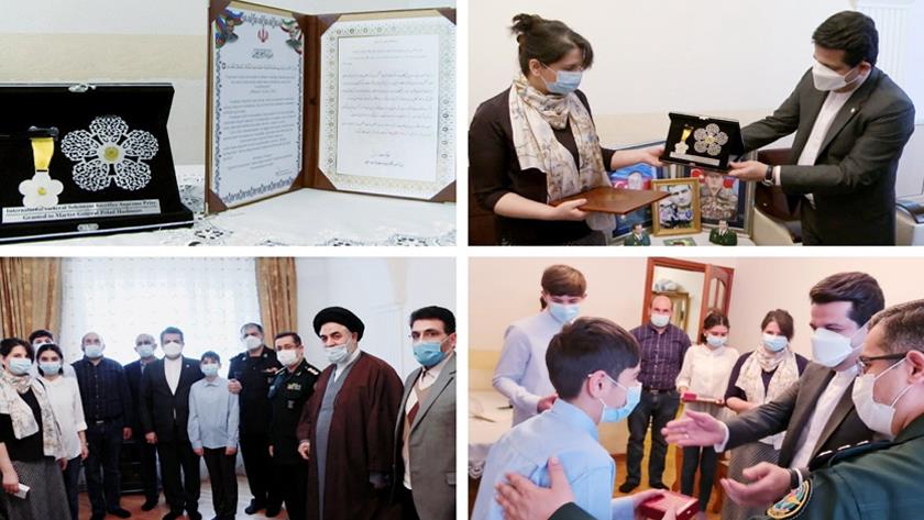 Iranpress: Iranian envoy pays tribute to Azerbaijani martyr