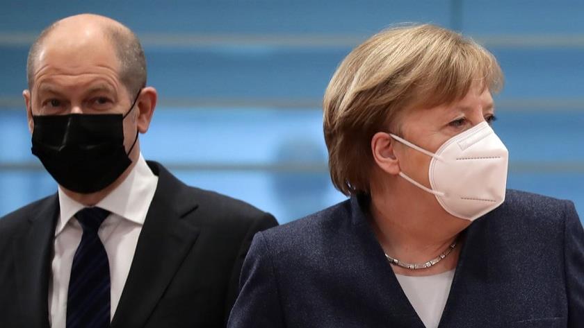 Iranpress: Merkel urges US to export Covid vaccines