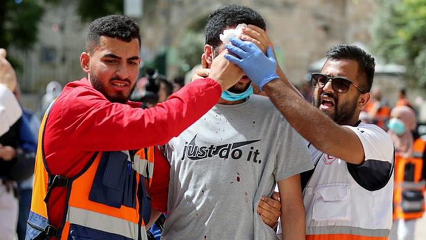 Iranpress: Number of Palestinians injured in Al-Aqsa Mosque reaches more than 330