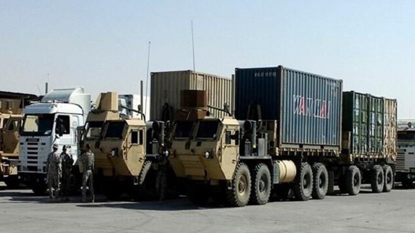 Iranpress: US military forces continue stealing wheat crops in Syria