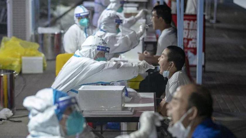 Iranpress: Wuhan city tests 11.23 million amid Covid-19 resurgence