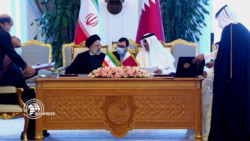 Iranpress: Iran, Qatar ink MOU on syncing Iran
