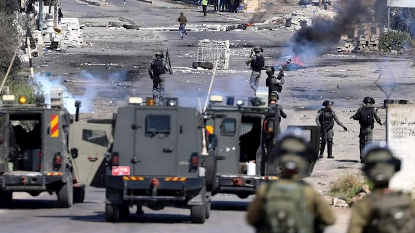 Iranpress: A Palestinian killed in Israeli raid on Jenin