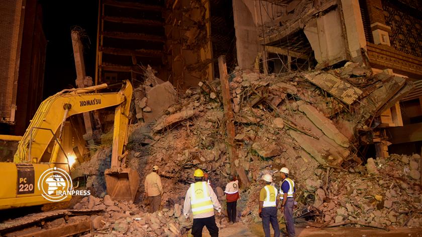 Iranpress: Debris removal continues in Iran
