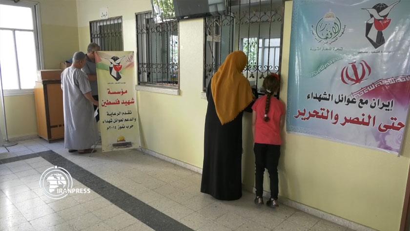 Iranpress: Iran provides aid to Palestinian martyrs