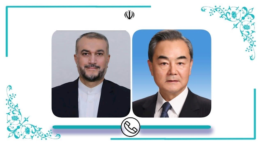 Iranpress: Iranian, Chinese FMs hold telephone consultations
