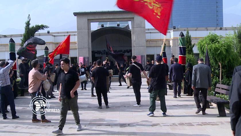 Iranpress: Mourning flag for Muharram month hoisted in Tehran
