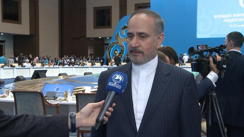 Iranpress: Significance of religious interaction in easing humanity