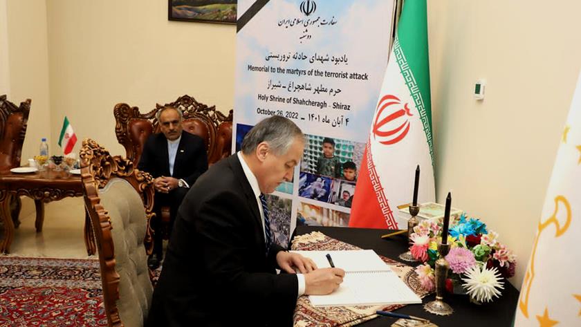 Iranpress: Tajikistan FM signs Shah Cheragh martyrs