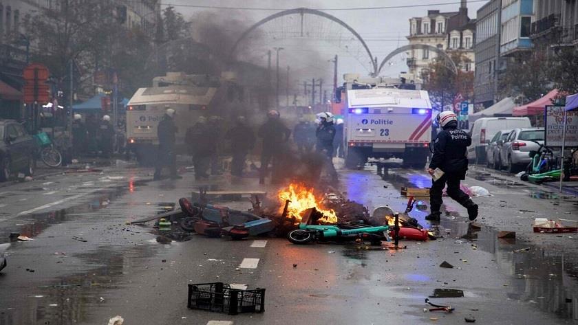 Iranpress: Belgian fans clash with police in Brussels after losing to Morocco 