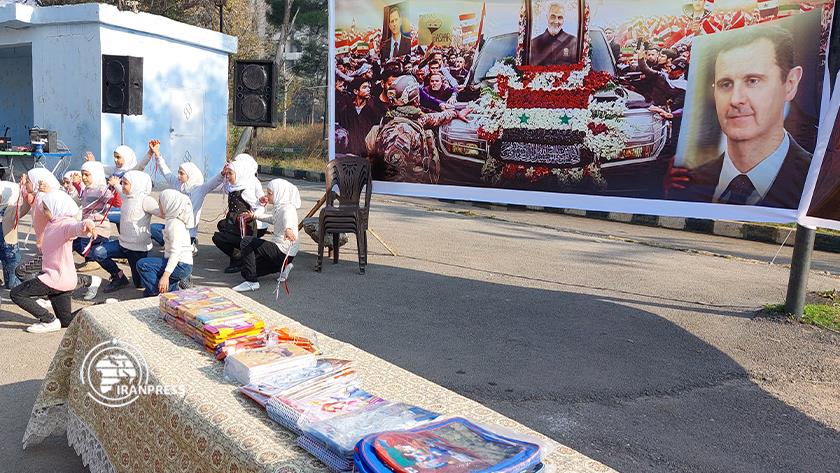 Iranpress: Syrian students pay homage to martyrs of Resistance in Aleppo
