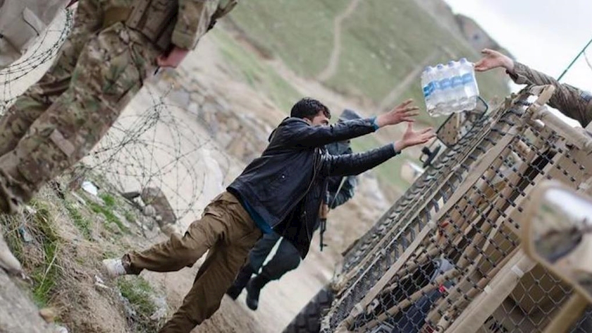 Iranpress: Major international aid groups halt mission in Afghanistan