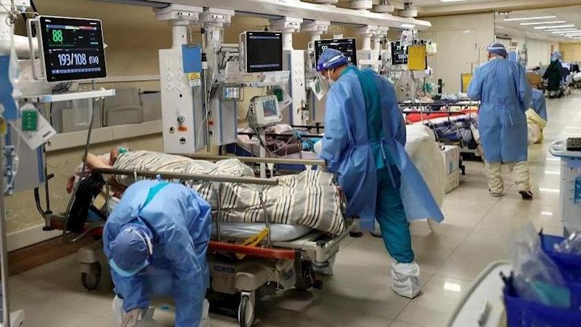 Iranpress: China reports almost 60,000 COVID-related deaths in past month