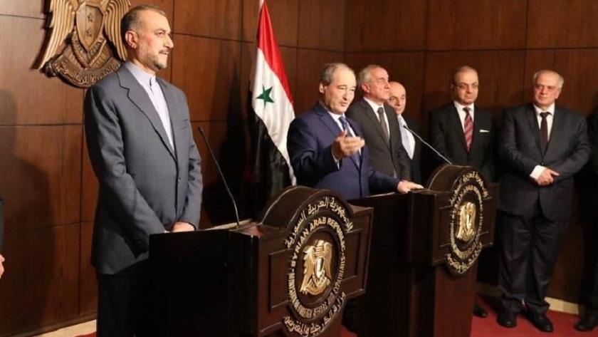 Iranpress: Mekdad: Iran, Syria boost cooperation to deal with sanctions