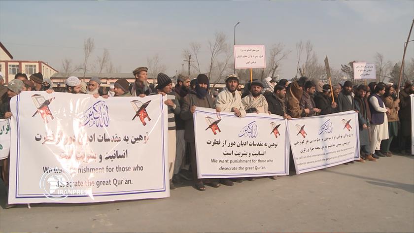 Iranpress: Afghans gather to condemn Qur