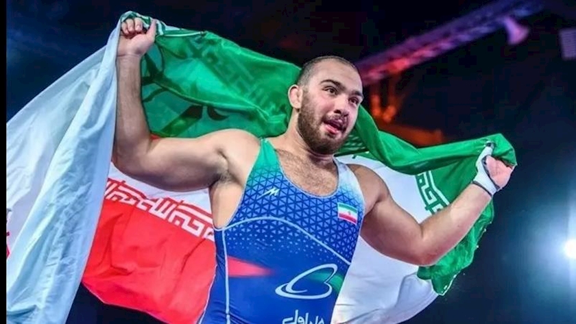 Iranpress: Heavey weight wrestler wins Iran