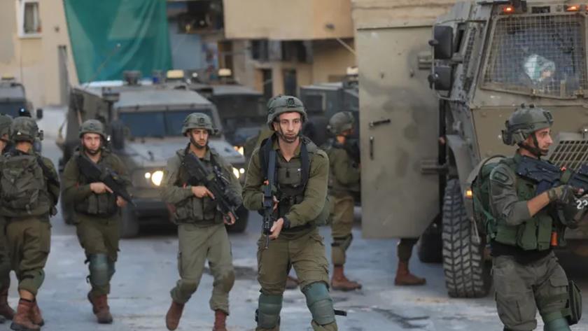 Iranpress: One killed, two injured in Israeli army assault on a refugee camp