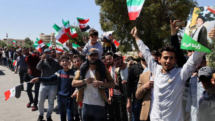 Iranpress: Syrian people welcome Raisi to Damascus 