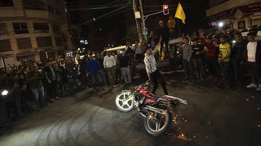 Iranpress: Palestinians celebrate victory as Israel yields to Resistance terms