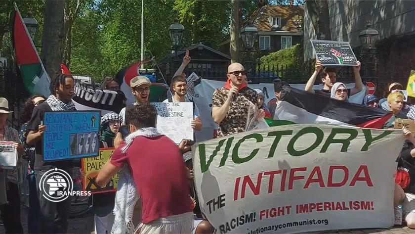 Iranpress: British Palestine supporters stage gathering right at Israeli regime embassy 