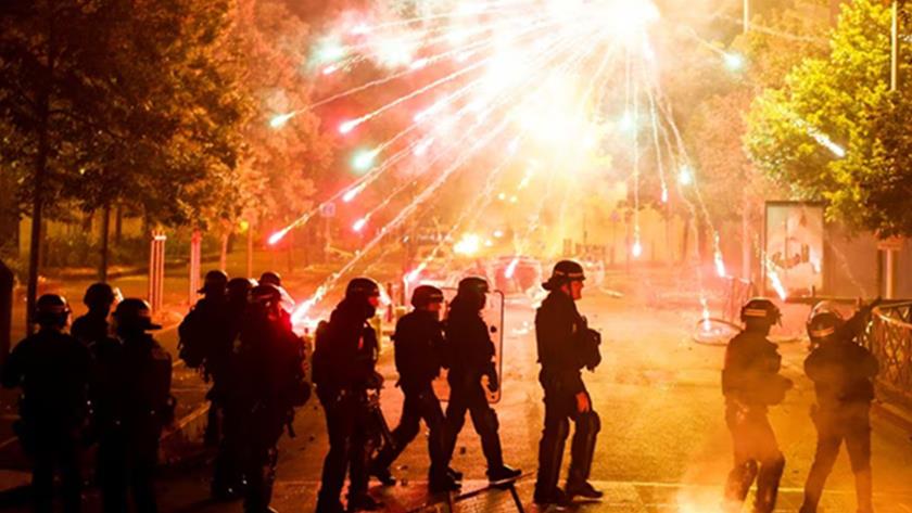 Iranpress: France unrest: Third night of riots after police shoot teen, officer charged