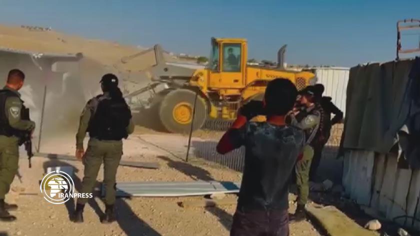 Iranpress: Israeli troops destroy Palestinians