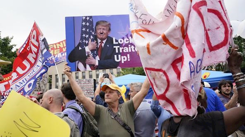 Iranpress: Trump appears in court as protesters gather outside