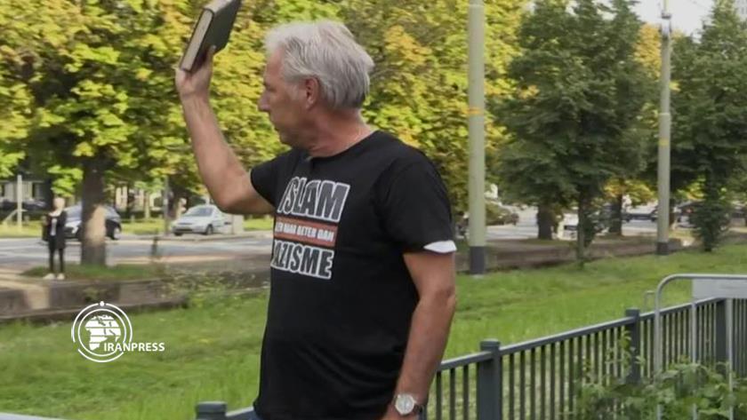 Iranpress: Far-right racist tears up Qur