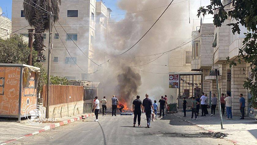 Iranpress: Five Palestinian injured by Israeli live bullets in Hebron